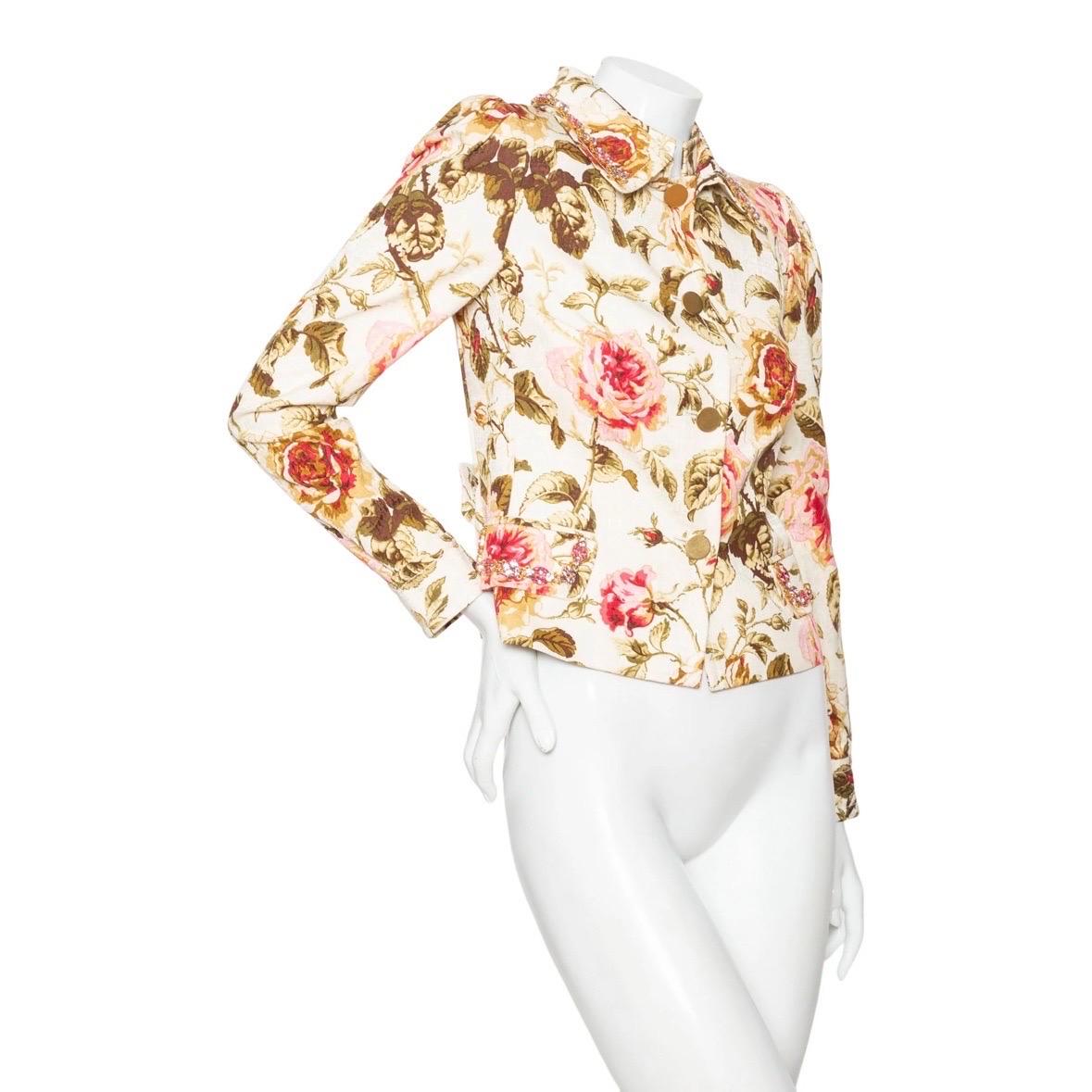 Dolce & Gabbana Floral Print Rhinestone Collared Jacket

Circa 2010s
Cream/Pink/Green
Floral print
Pointed collar with rhinestone trim
Front flap pockets with rhinestone trim
Front button closure with matte gold-tone buttons
Belted back detail
Made