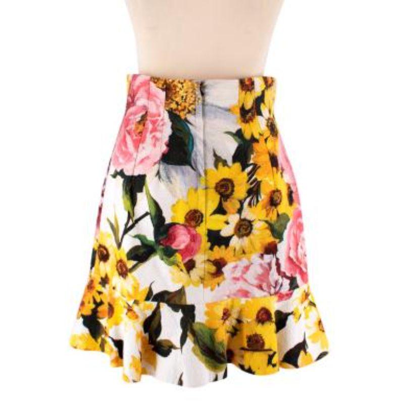 Dolce & Gabbana Floral Print Skirt
-Yellow, pink, and green floral print with white background
-Concealed zip on right side
-Lined
-Light-weight
-Flared hem 

Material
-99% Cotton
-1% Elastane

Washing
-Dry clean

MADE IN ITALY

PLEASE NOTE, THESE