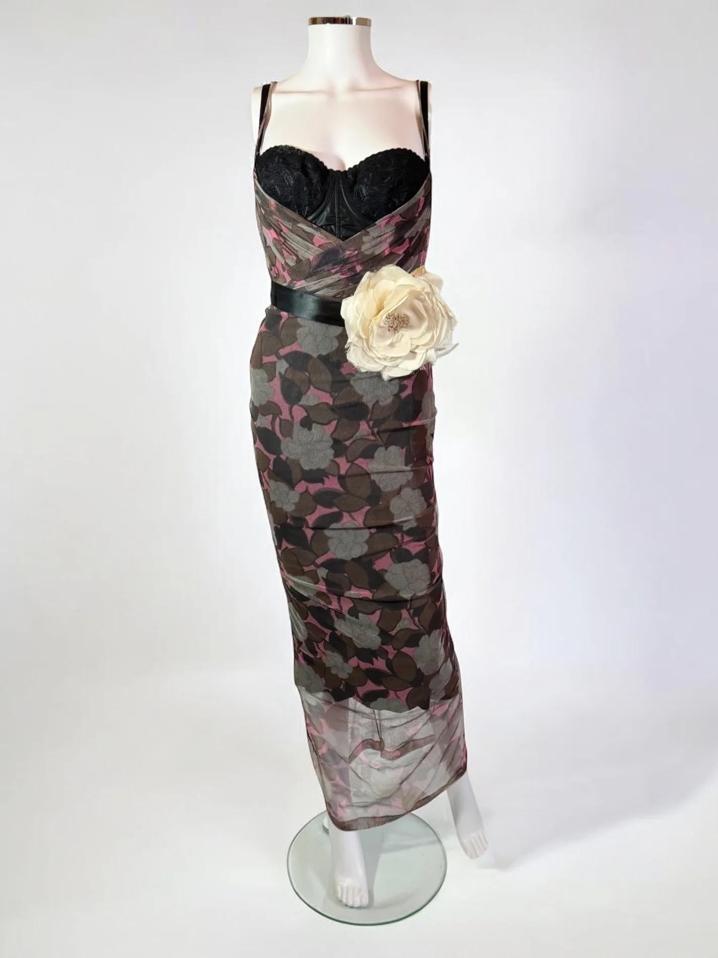 Dolce & Gabbana floral tulle bodycon dress, Spring Summer 2004
Look 50 on runway modelled by Amanda Moore, and same print modelled by Naomi Campbell in look 49.
Black slip dress underneath with pink floral printed tulle dress mounted on top which