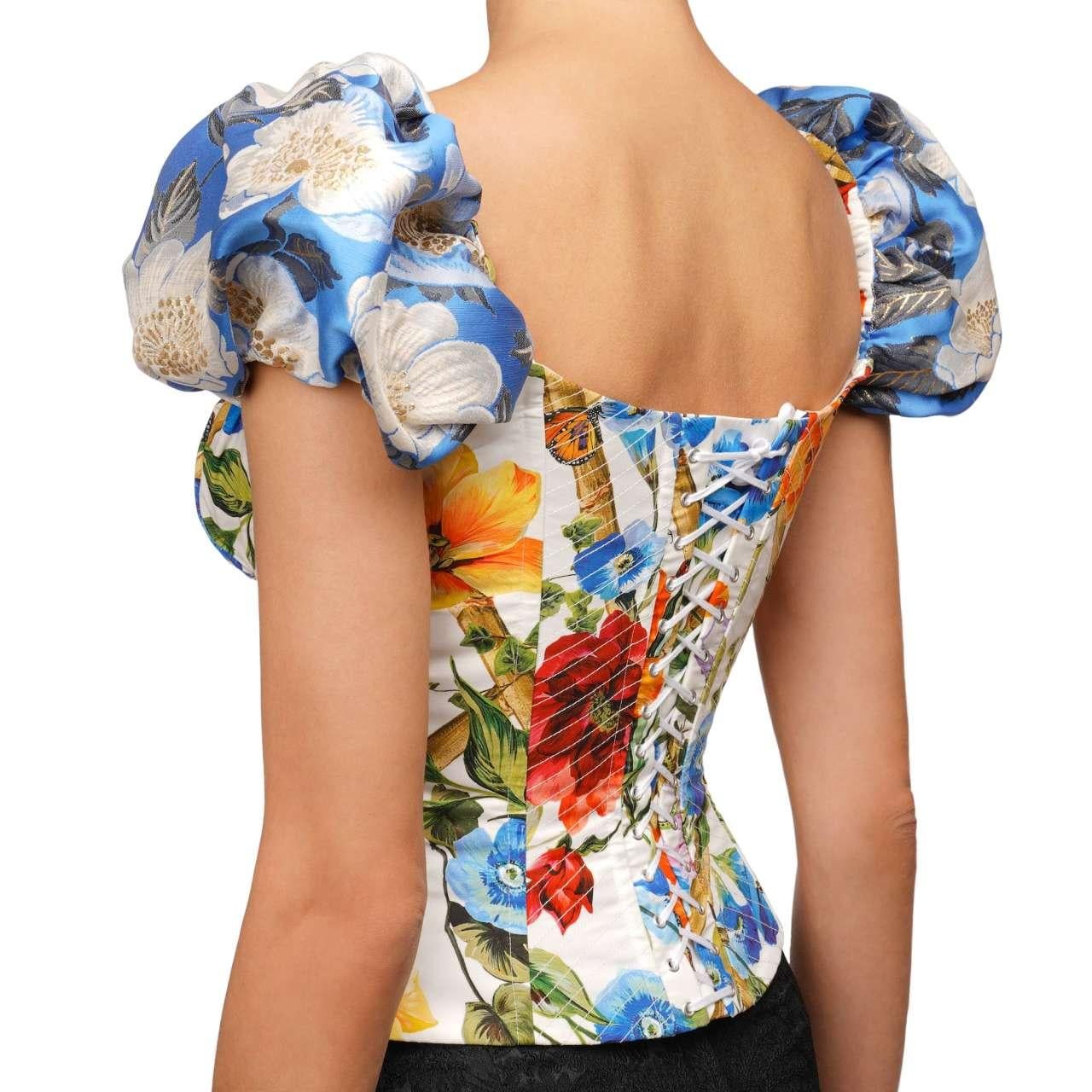 - Corsage Top with flower, bugs and lizard print and ballon sleeves in white, orange and blue by DOLCE & GABBANA - New with tag - MADE IN ITALY - Former RRP: EUR 1,200 - Slim Fit - Modell: F7ZR9T-FS57R1-HAM64 - Material: 80% Cotton, 16% Polyester,
