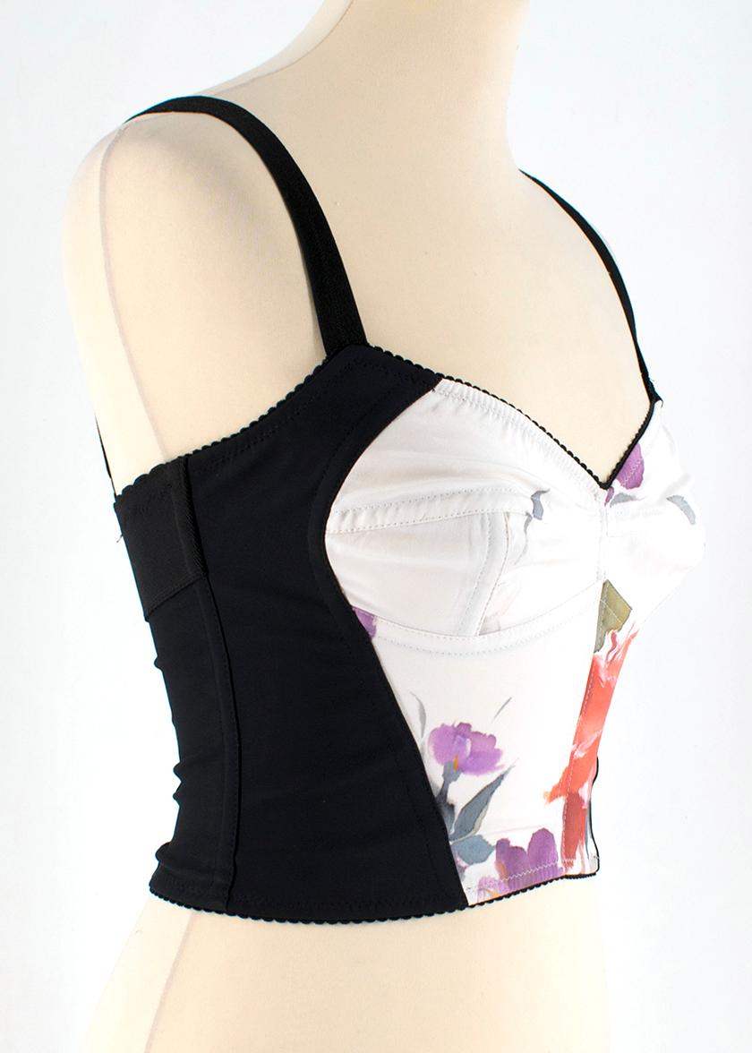 Dolce & Gabbana Flower Print Silk Bustier Top

- silk buster top
- flower print vibes
- adjustable straps 
- silver zip fastening to the back
- white silk lining 

Please note, these items are pre-owned and may show some signs of storage, even when