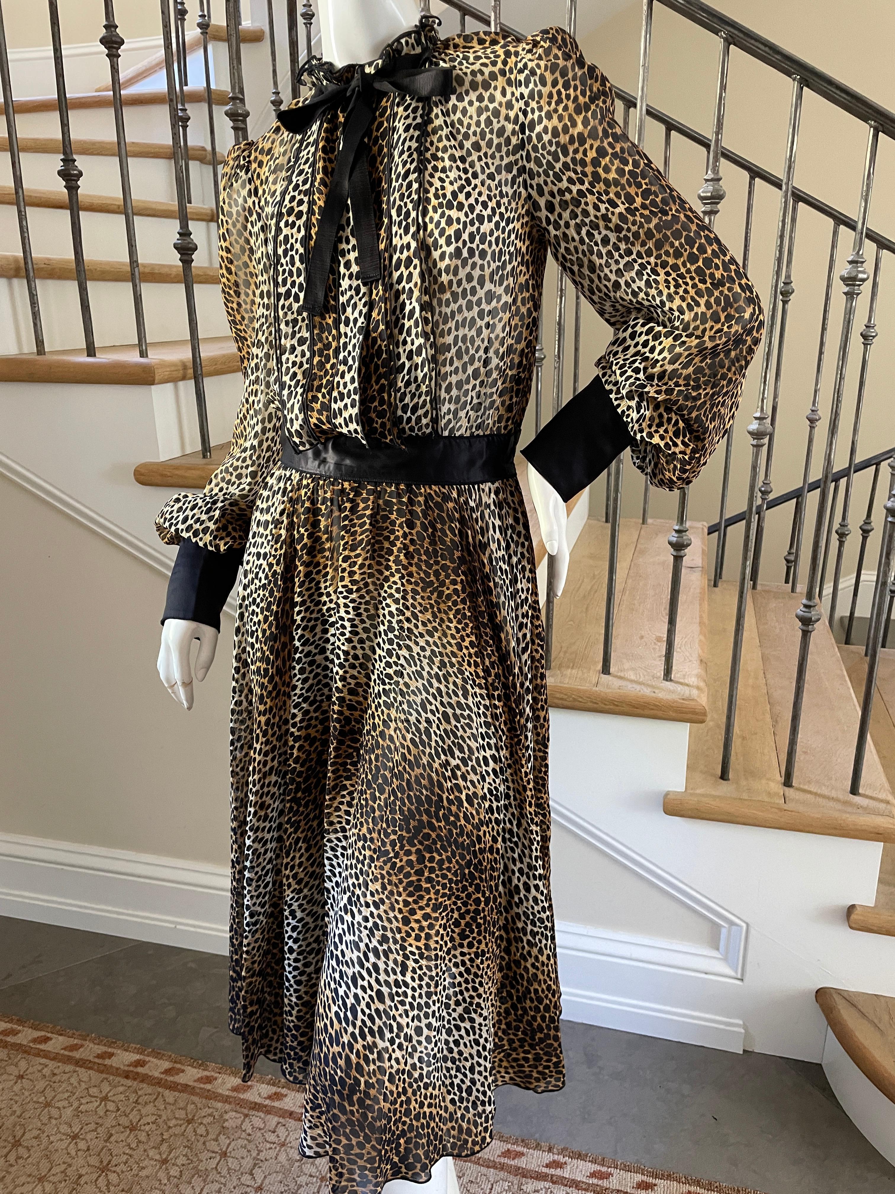 Dolce & Gabbana for D&G Sheer Silk Leopard Print Cocktail Dress .
 This is so wonderful, so sexy. the photos don't do it justice.
Comes with slip.
Size 38 appx , size and fabric label removed
  Bust 36