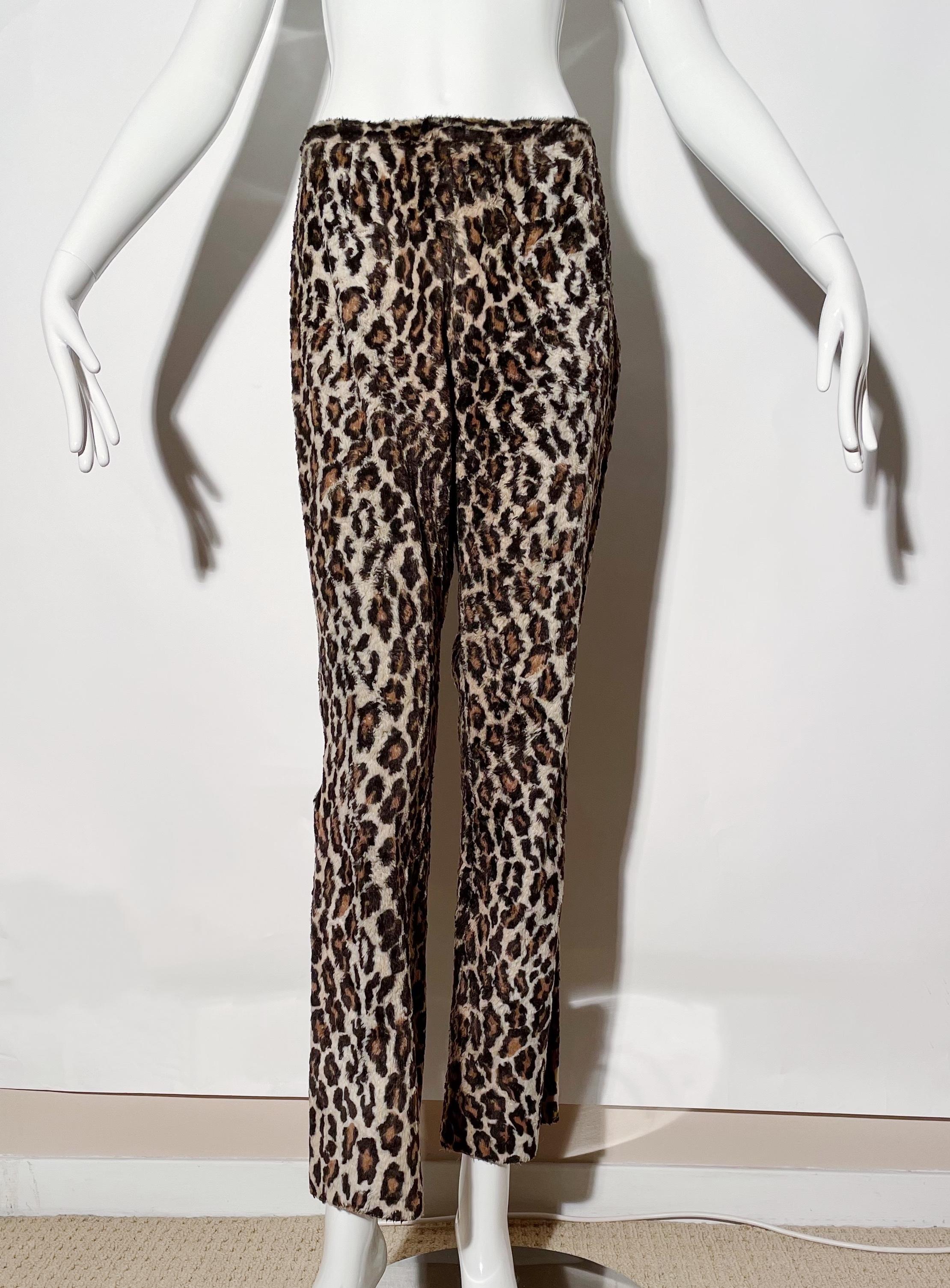 Fuzzy leopard print pants. Side zipper closure. Bootcut. 
*Condition: excellent vintage condition. No visible flaws.

Measurements Taken Laying Flat (inches)—
Waist: 29 in.
Hip: 34 in.
Rise: 10 in.
Inseam: 29 in.
Marked size: 44 IT, best fit for
