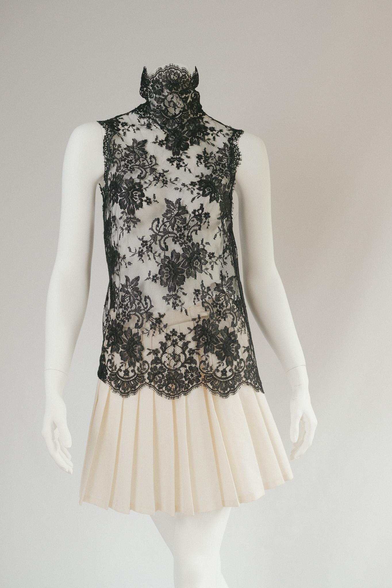 DOLCE & GABBANA FW 2001 lace turtle neck top dress. This beautiful lace was featured throughout the runway in various colours and styles - can also be worn as a dress over stockings but is VERY short . 

Original tags still attached never worn