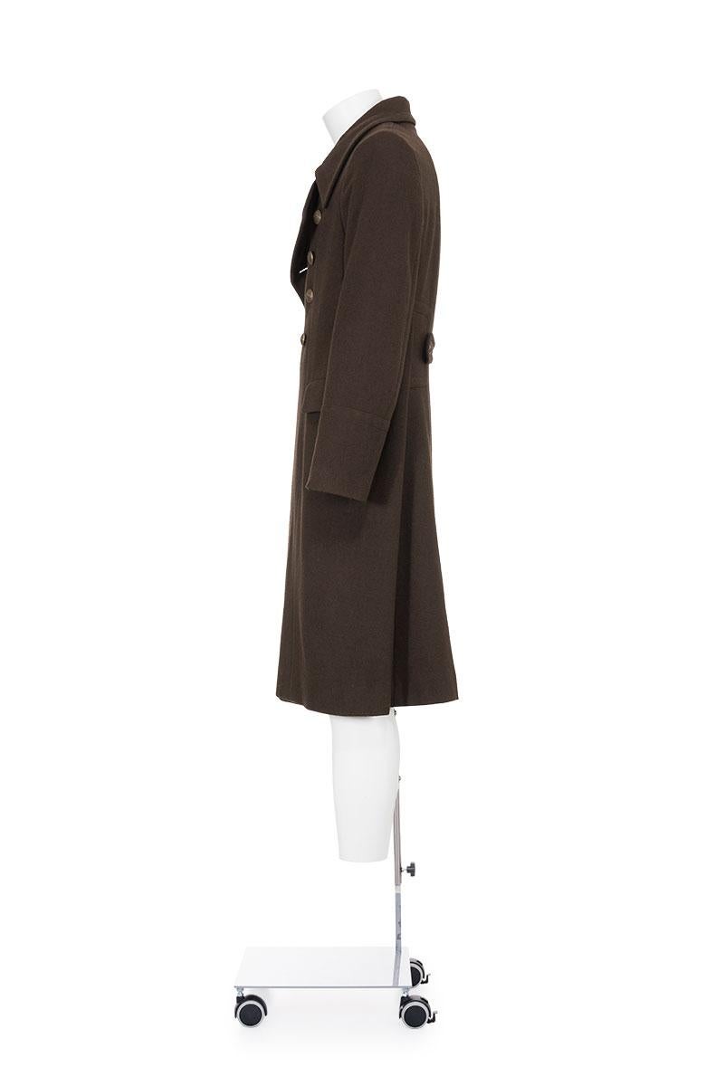 Fall Winter 1991 rare and iconic military coat with embellished buttons by Dolce & Gabbana.
Martingale at back.
Two flap pockets.
The composition is 75% wool and 25% nylon.

