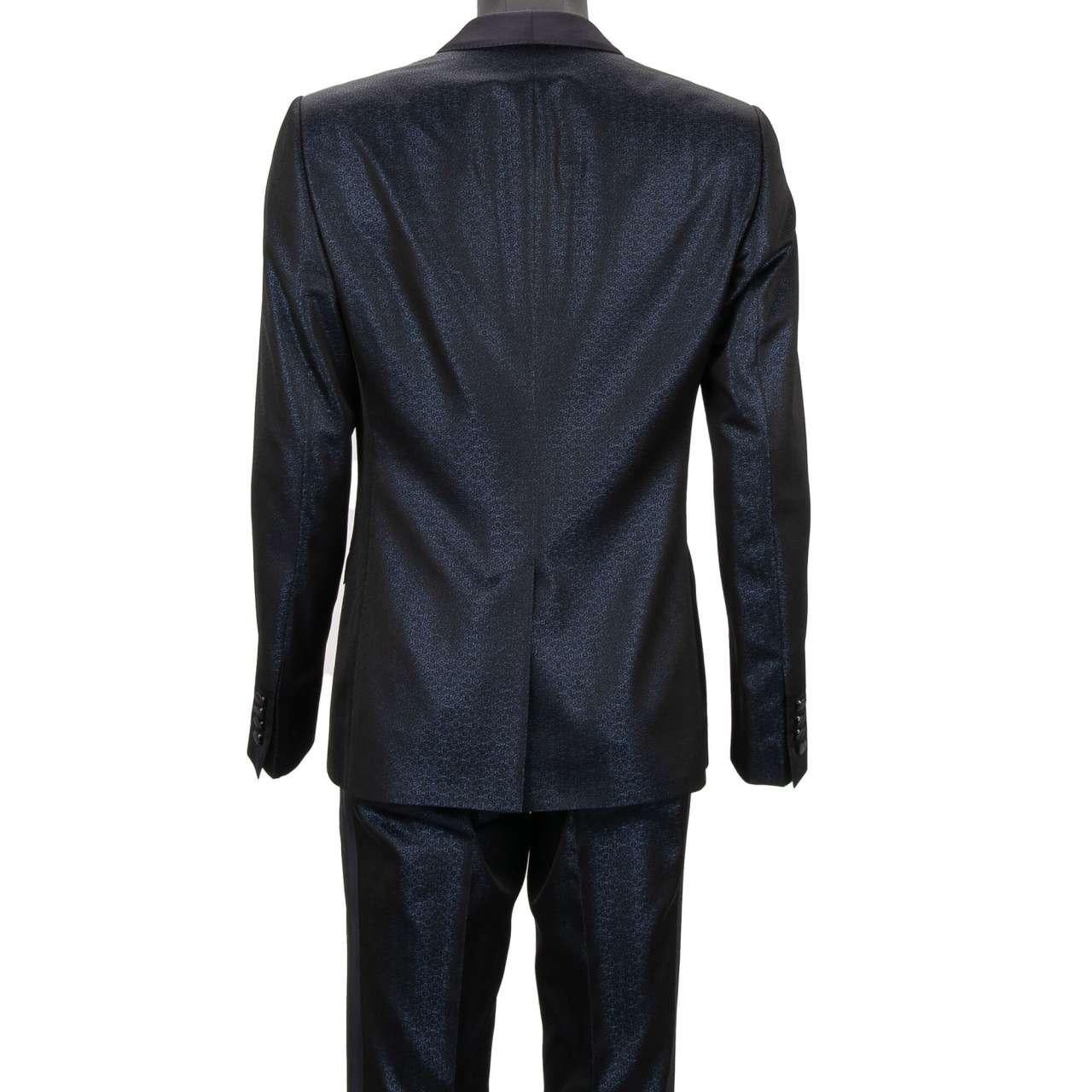 - Glitter Jacquard suit with silk shawl lapel in blue by DOLCE & GABBANA - GOLD Model - RUNWAY - Dolce & Gabbana Fashion Show - New with tag - Former RRP: EUR 2,150 - MADE in ITALY - Slim Fit - Model: GK1DMT-FJM53-S8351 - Material: 58% Acetate, 22%