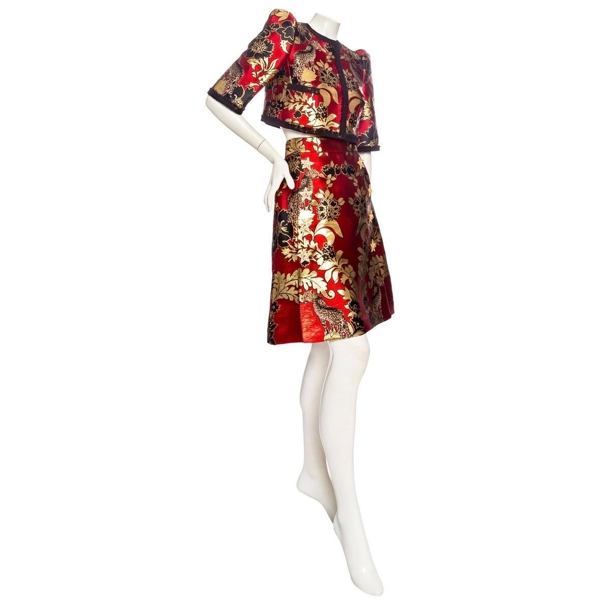 Dolce & Gabbana Gold and Red Leopard Motif Jacquard Jacket and Skirt Set

Red/Black/Gold
Set includes half-sleeve jacket and skirt
Jacket features a puffed sleeve, contrasting tulle trim, front patch pockets, a high round neckline, snap button front