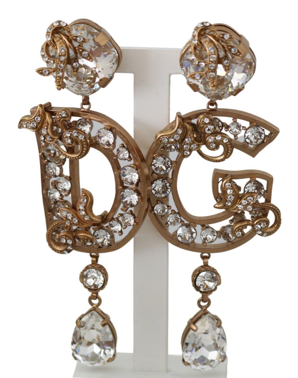  Gorgeous brand new with tags, 100% Authentic Dolce & Gabbana metallic DG crystal clip-on drop earrings.




Model: Clip-on, drop
Motive: Logo
Material: Crystal , Brass

Color: Gold

Crystal: Clear

Logo details
Made in Italy

Length: 10cm



Dolce