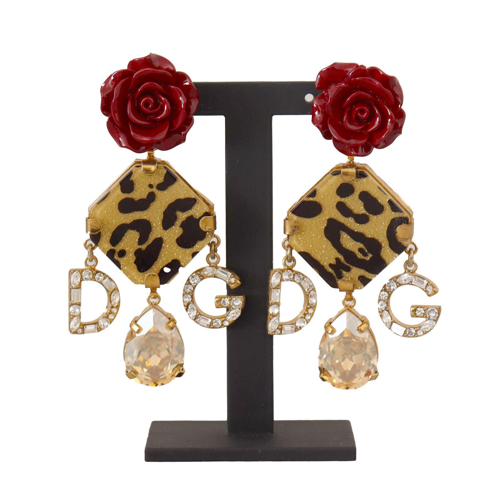 Dolce & Gabbana
Gorgeous brand new with tags, 100% Authentic Dolce & Gabbana Earrings.



Model: Clip-on Dangling
Motive: Roses Leopard
Material: 40% Brass, 20% PVC, 20% Glass, 20% Resin

Color: Gold and red

Logo details
Made in Italy

Length: