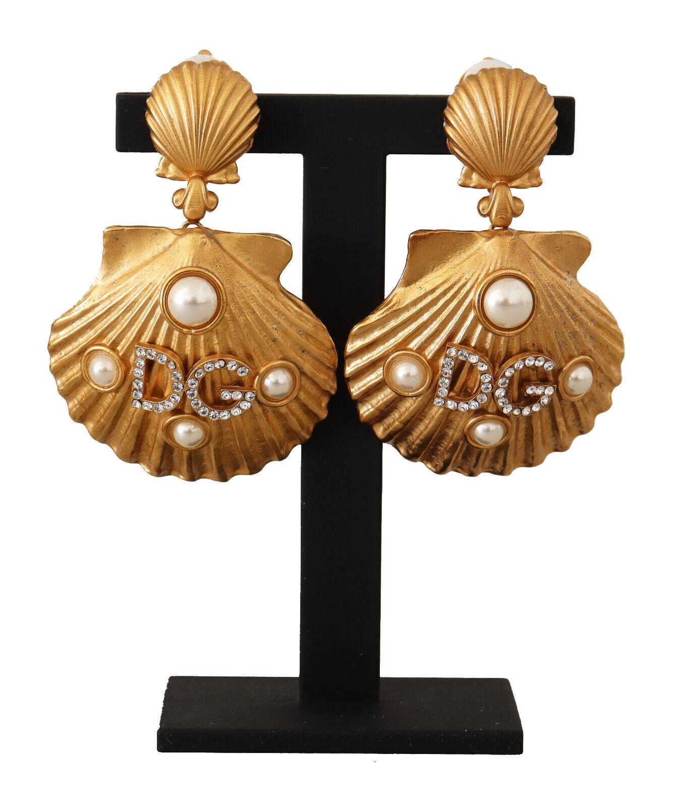 DOLCE & GABBANA

Gorgeous brand new with tags, 100% Authentic Dolce & Gabbana Earrings.



Model: Clip-on Dangling
Motive: Seashell
Material: 80% Brass, 20% Glass

Color: Gold

Logo details
Made in Italy

Length: 5cm


Dolce & Gabbana Box, Original