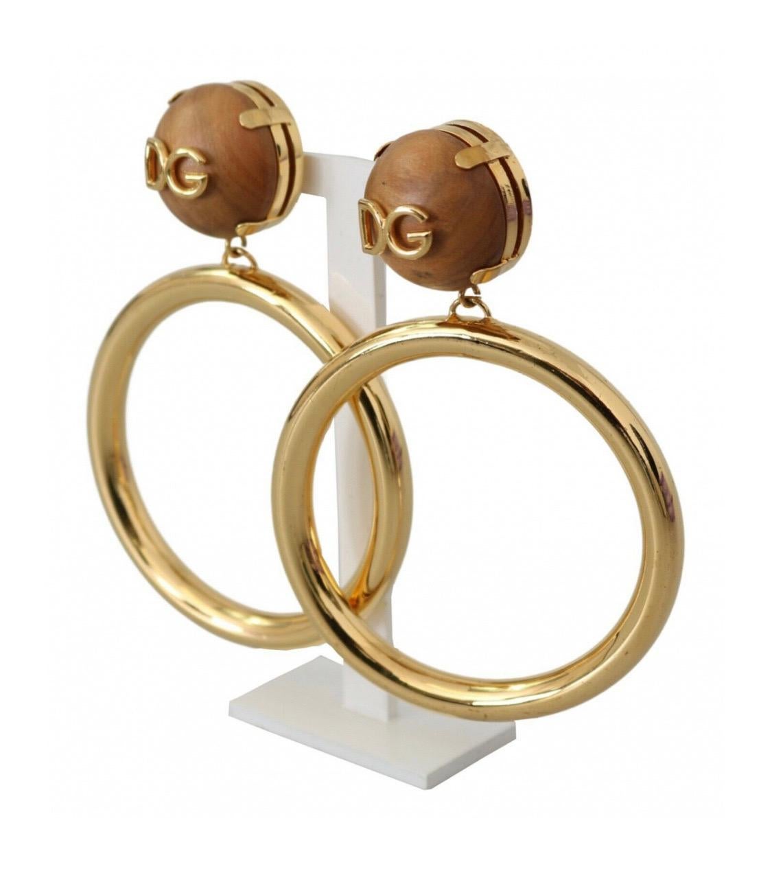 Dolce & Gabbana gold brass
hoop earrings with wooden clip on 2