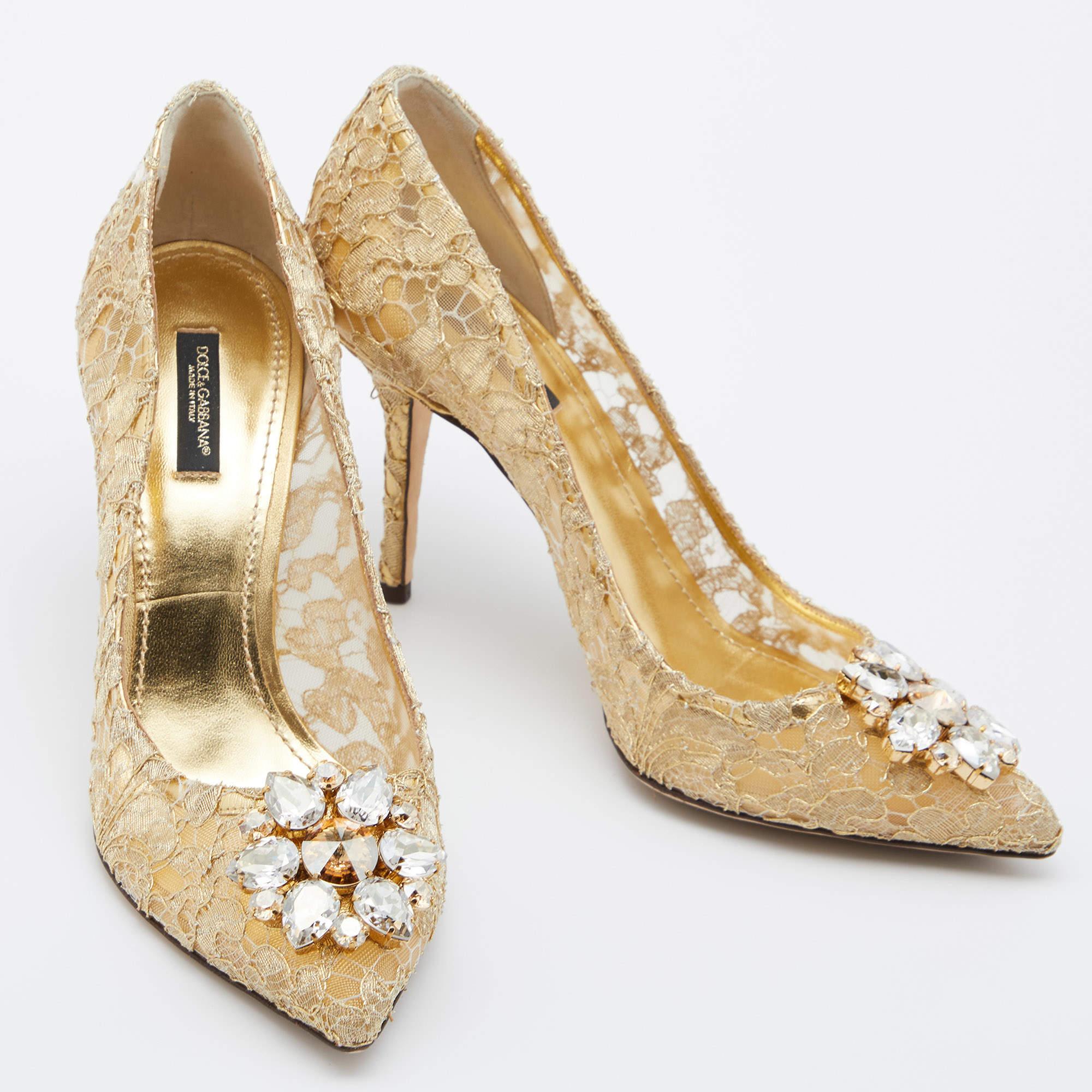 These pumps by Dolce & Gabbana are perfect to be paired with any outfit of your choice. Luxe, stylish and elegant, they have been crafted from lace and styled with pointed toes, slim heels, and crystals.

Includes: Original Dustbag