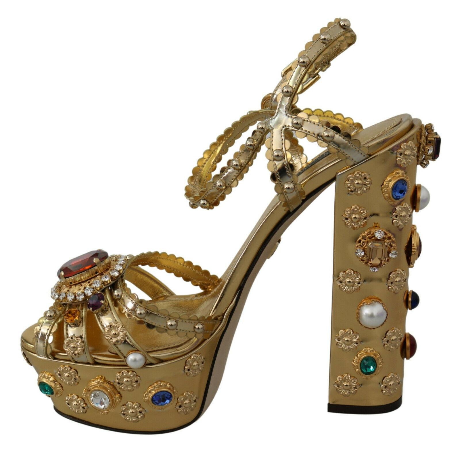 Gorgeous brand new with tags, 100% Authentic Dolce & Gabbana Gold Ankle Strap Sandals with Multicolor Crystal.

 

Ankle Strap Sandals


Color: Gold
Material: 100% Leather


Sole: Leather


Logo details

Very high quality and comfort

Made in