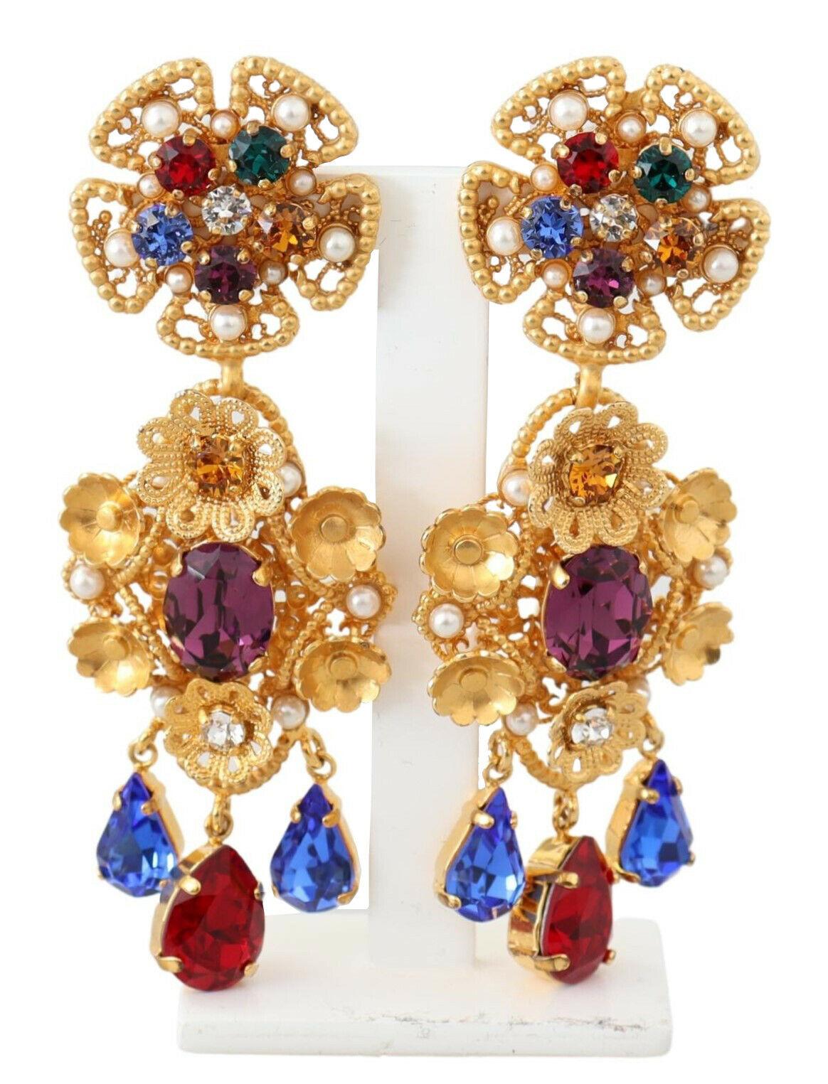 Gorgeous brand new with tags, 100% Authentic Dolce & Gabbana Gold Tone Brass Multicolor Crystal Drop Clip On Earrings.

Model: Clip-on, dangling
Motive: Crystals
Material: Brass, crystals

Color: Gold
Crystals: Multicolor
Logo details
Made in