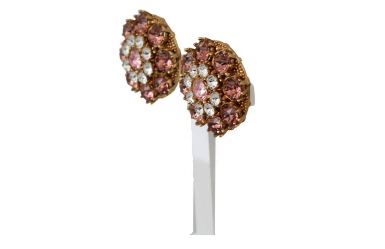  Gorgeous brand new with tags, 100% Authentic Dolce & Gabbana earrings.




Model: Clip-on
Motive: Filigree round
Material: 70% Brass, 30% Glass

Color: Gold, pink
Crystals: Clear, pink
Logo details
Made in Italy


Length: 4cm


Dolce & Gabbana