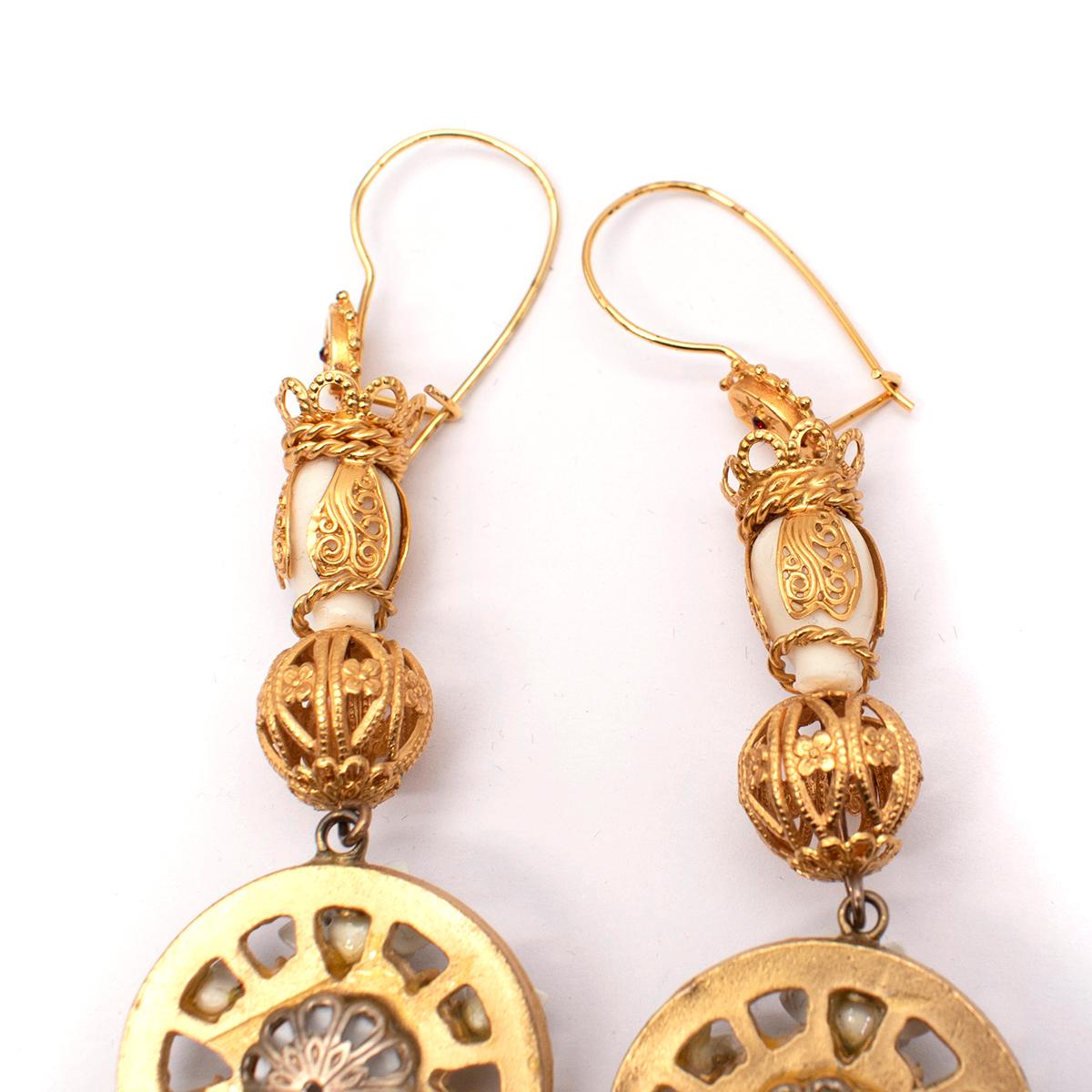 Dolce & Gabbana Gold Pupi Doll & Cartwheel Earrings 

- Articulated gold-tone drop earrings featuring a ceramic pupi doll, cartwheel and floral motifs 
- Earwire, for pierced ears

Materials:
Gold Brass 
Resin 
Crystal

Measurements:
12cm length