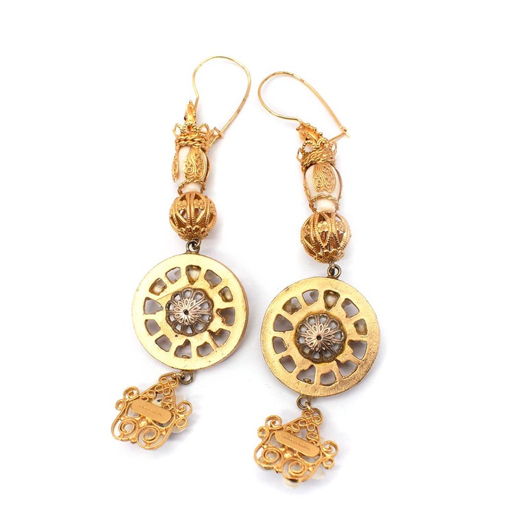 Dolce and Gabbana Gold Pupi Doll and Cartwheel Earrings For Sale at 1stDibs