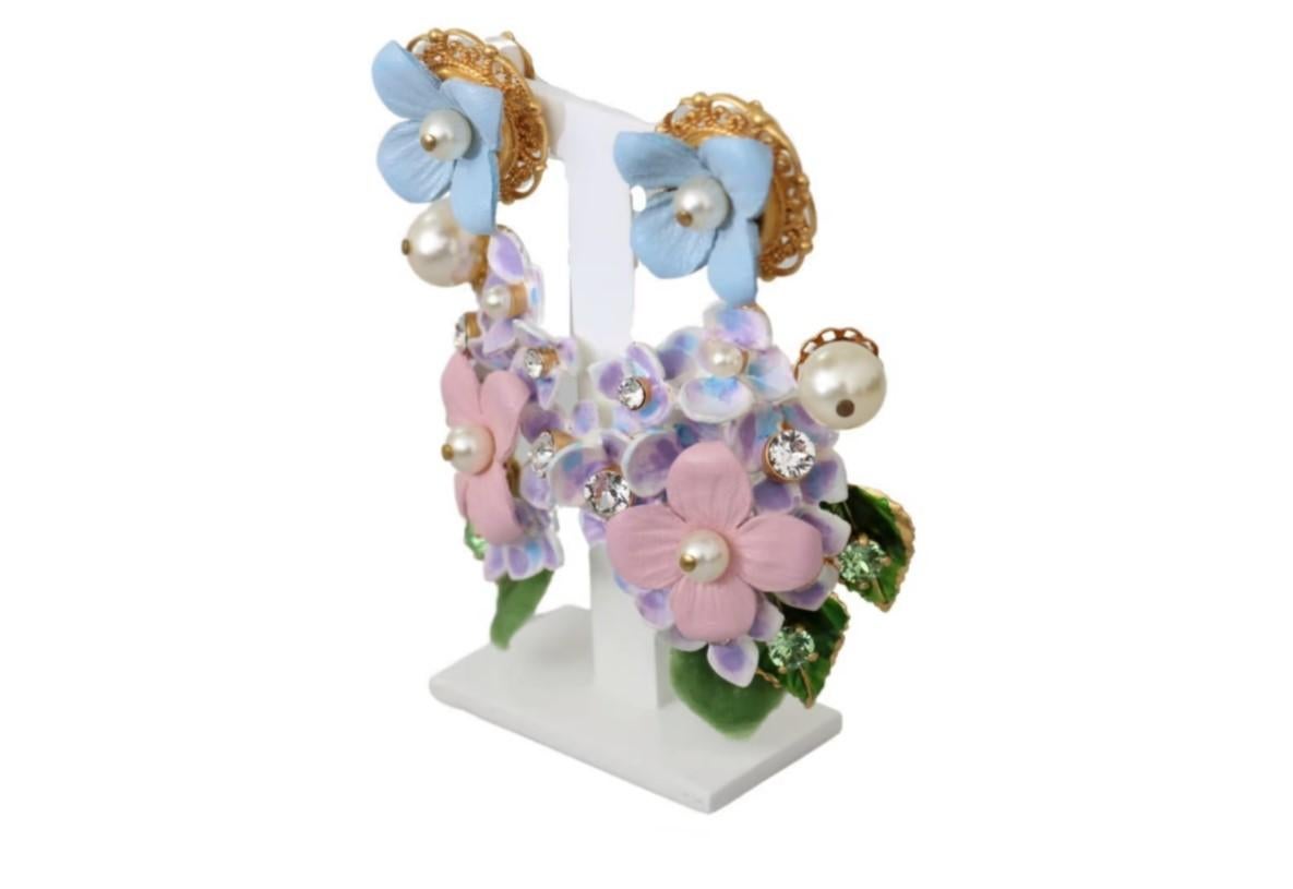  Gorgeous brand new with tags, 100% Authentic Dolce & Gabbana earrings.




Model: Clip-on, dangling
Motive: HORTENSIA BOUQUET, flowers, pearls
Material: 40% Brass, 30% leather, 20% crystals, 10% PA

Color: Gold, purple, pink
Crystals: Clear
Logo
