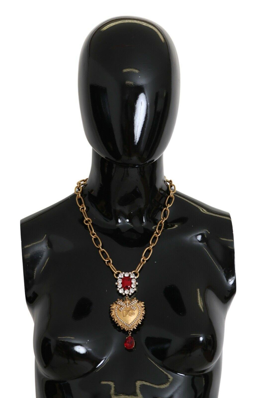 Gorgeous brand new with tags, 100% Authentic Dolce & Gabbana sacred heart pearl pendant necklace with red crystals. 




Model: Statement necklace
Motive: Sacred heart
Material: Brass, Crystal

Color: Gold
Crystal: Red
Lobster clasp closure
Logo