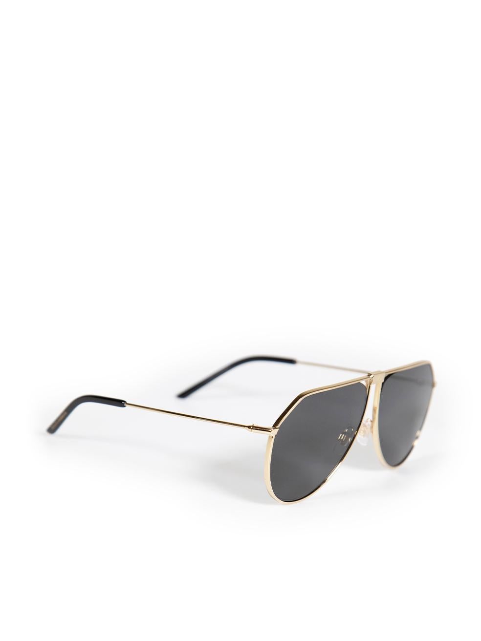 CONDITION is Very good. Hardly any visible wear to the sunglasses is evident on this used Dolce & Gabbana designer resale item. This item comes with an original case.
 Details
 Gold
 Metal
 Aviator sunglasses
 Tinted
 Branding on arms
 DG logo on
