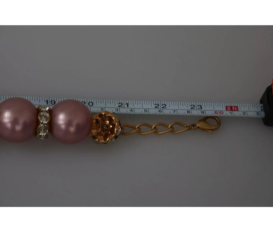 Dolce & Gabbana gold-tone necklace decorated with pink pearls In New Condition In WELWYN, GB