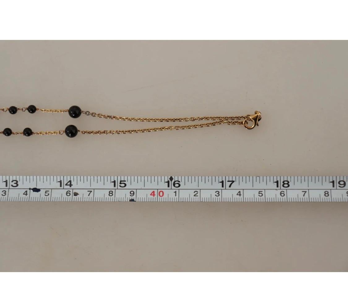 Dolce & Gabbana Gold-tone necklace with a rosary motif. Made of silver. In New Condition In WELWYN, GB