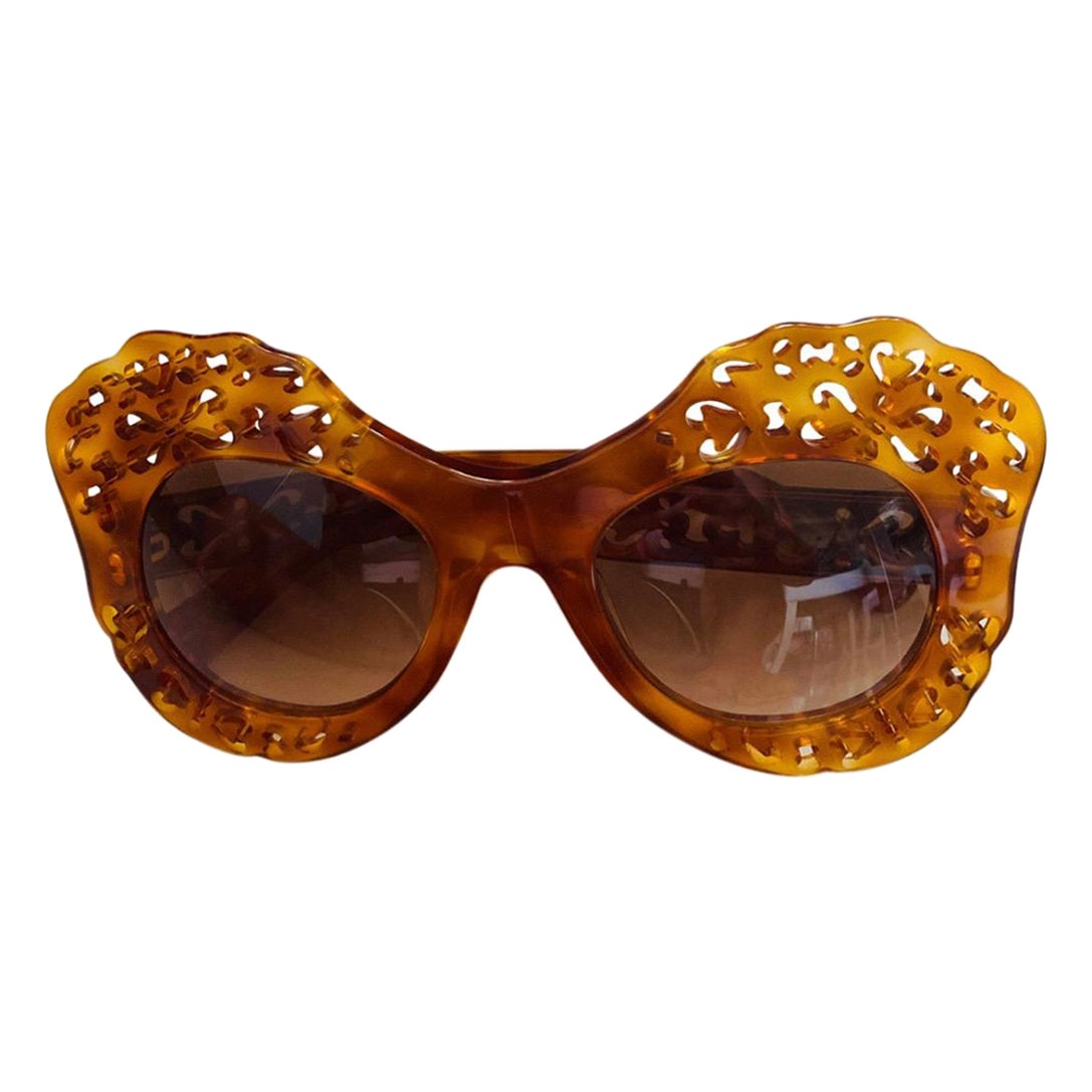 Dolce 
Gabbana - Brun doré
Lunettes de soleil en plastique en vente