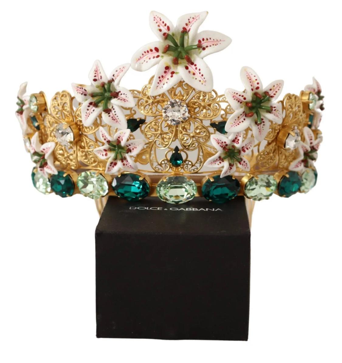 DOLCE & GABBANA

Absolutely stunning, 100% Authentic, brand new with tags Dolce & Gabbana golden tiara with an openwork pattern in the form of buds and hand-painted enamel lilies, the decor is supported by sparkling large crystals. Made from