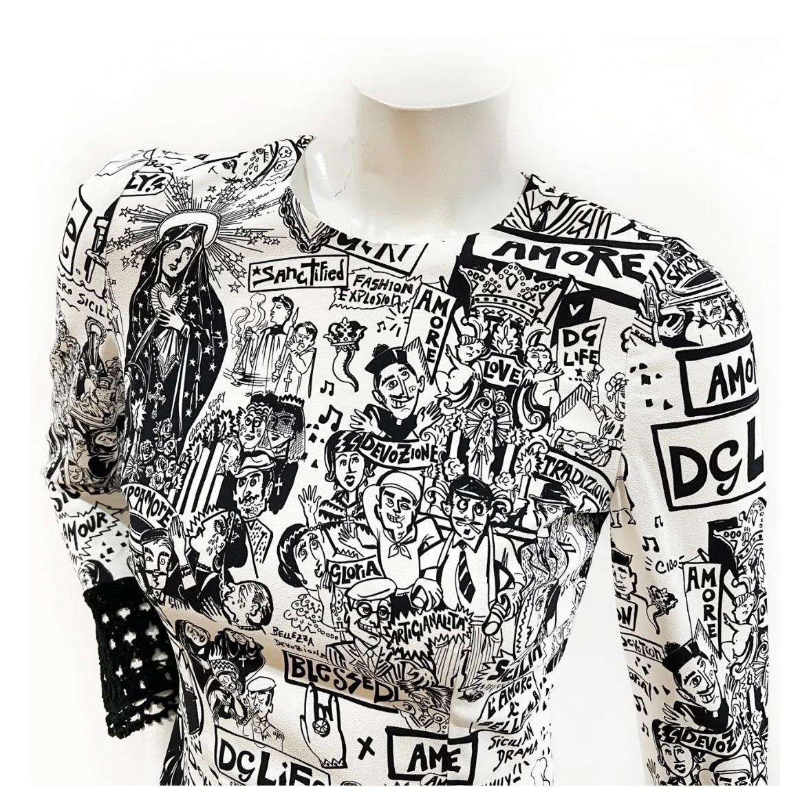 Graffiti logo print dress by Dolce & Gabbana 
Fall 2022
Made in Italy 
White with black graffiti logo doodling throughout
Black crochet lace cuff and bottom hem detail 
Back zip closure 
Long sleeves
Hits between knee and ankle
Back slit 
Charmeuse