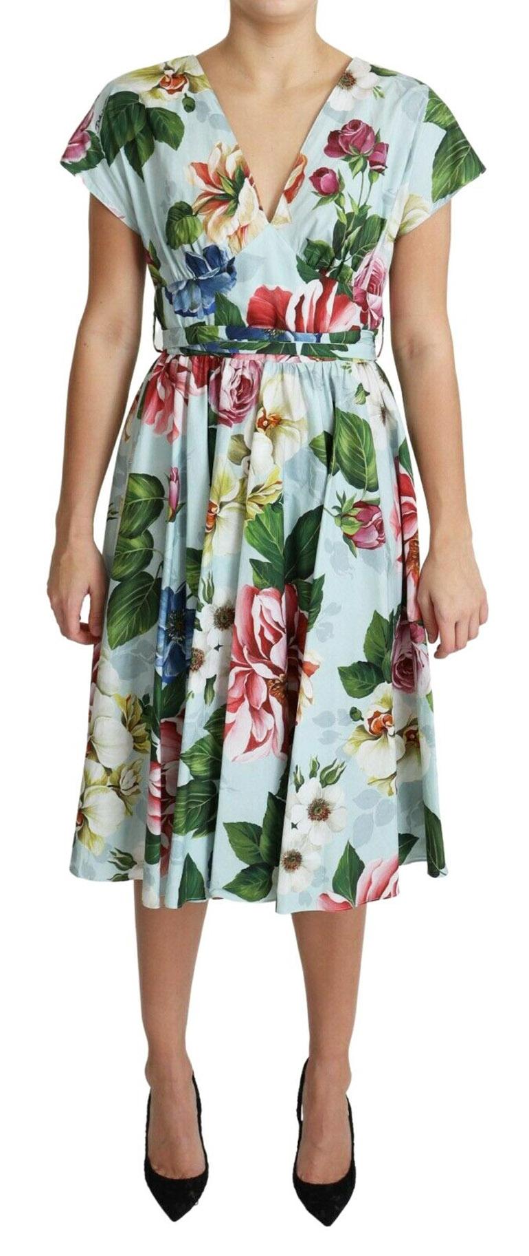 Gorgeous brand new with tags, 100% Authentic Dolce & Gabbana Green dress. Made of cotton. Zip fastening at the back. Decorated with a colorful floral print and gathers. V-neck.


Model: Short Sleeves V-neck

Color: Green multicolor floral