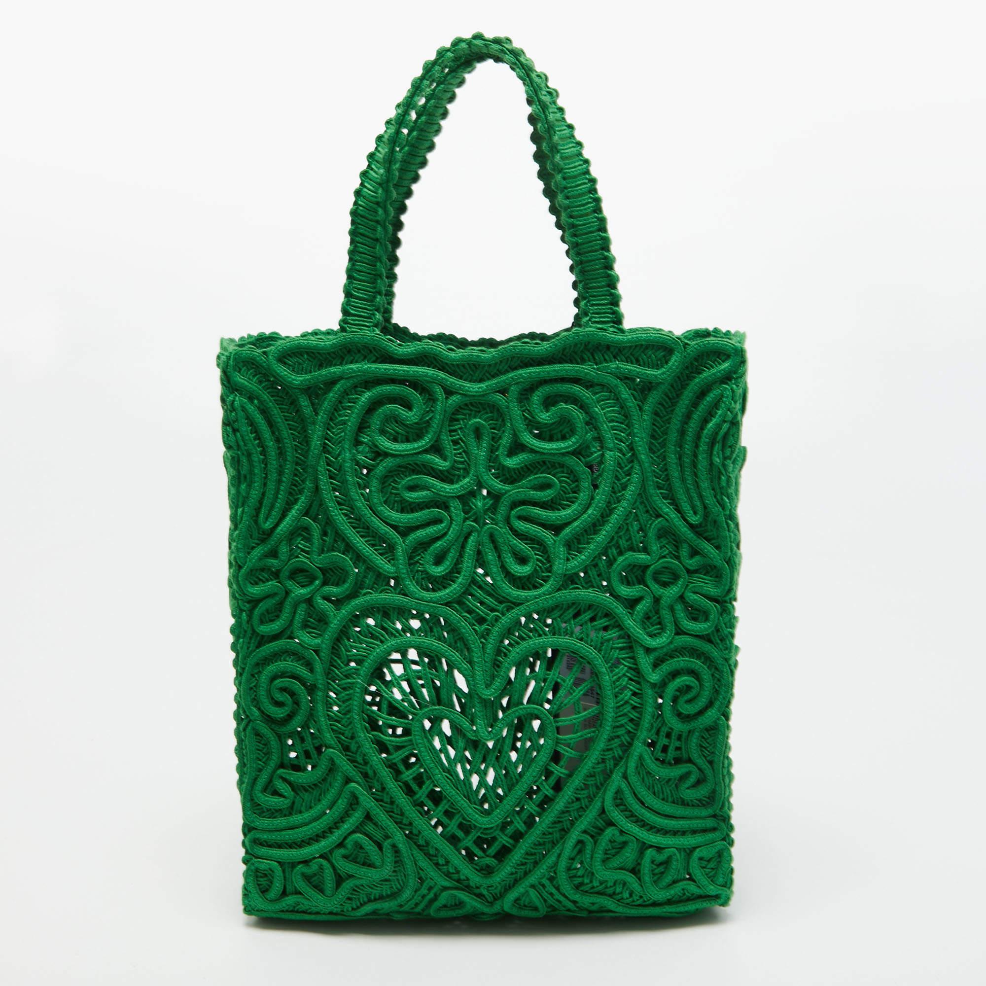 This Dolce & Gabbana crochet Beatrice tote will make a fine pick for when you're heading to a lunch date or curating a vacation edit. We like the vibrant color, simple details, and its high-quality finish.

Includes: Authenticity Card, Info Booklet,