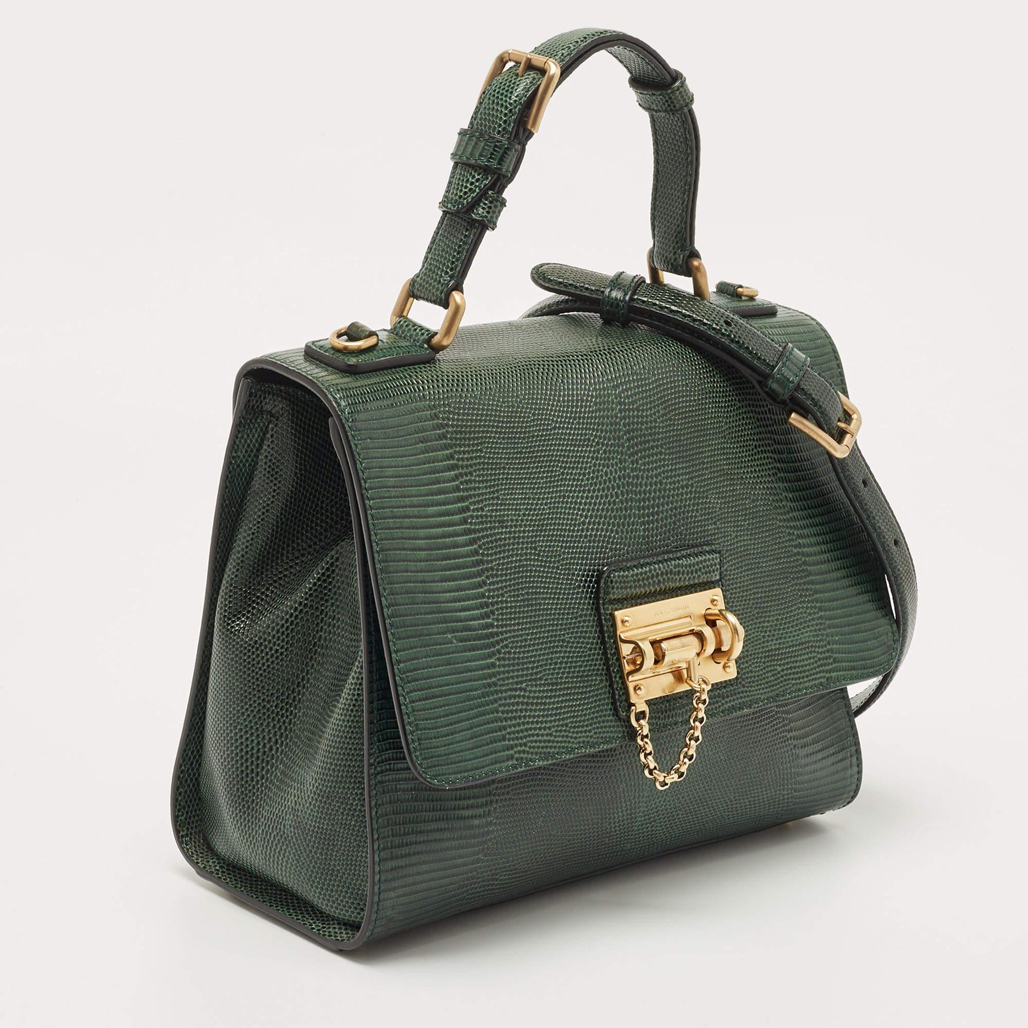 Exuding unparalleled elegance and sophistication, this bag is made from the finest material in a gorgeous hue. While the roomy interior offers ample space, the top handle allows you to carry it with much elegance.


