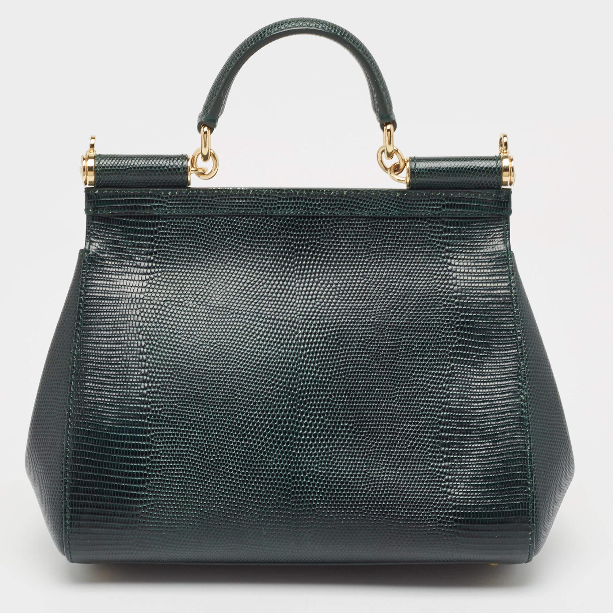 Presented for the 2009 Fall/Winter collection, Miss Sicily from Dolce & Gabbana represents the brand's regard for Italian essence and feminine style. This green creation comes made from Iizard-embossed leather and can be carried conveniently by dual