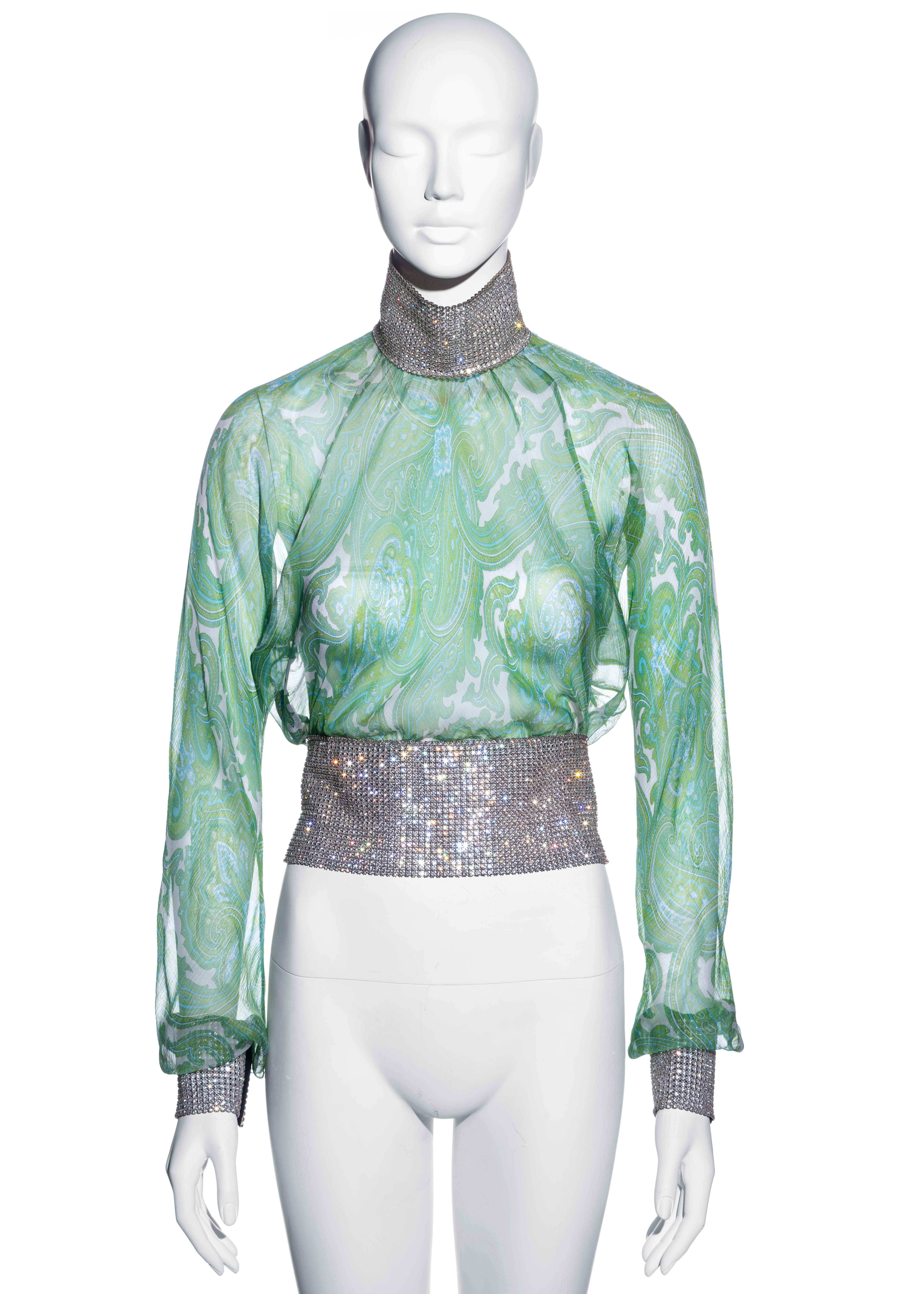 ▪ Dolce & Gabbana green paisley silk blouse
▪ 100% Silk 
▪ Large rhinestone mesh choker collar, cuffs and waistband 
▪ Velcro closures 
▪ IT 44 - FR 40 - UK 12 - US 8
▪ Spring-Summer 2000