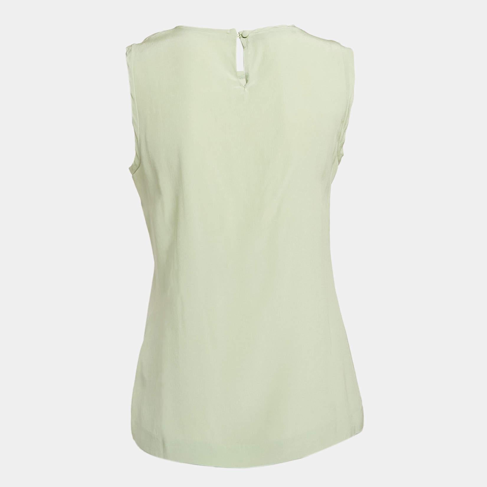 Questo top griffato offre stile e comfort. Realizzata con i migliori tessuti, la creazione è stata curata nei minimi dettagli. Abbinalo a una gonna e a dei tacchi.