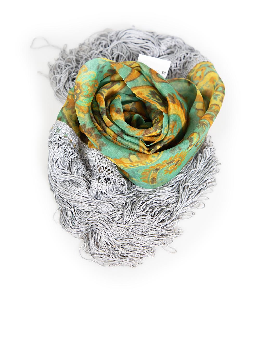 CONDITION is Very good. Minimal wear of the scarf is evident, there is mild discolouration on the fabric composition label and some loose tassel strings on this used Dolce & Gabbana designer resale item.
 
 
 
 Details
 
 
 Green
 
 Silk
 
 Scarf
 
