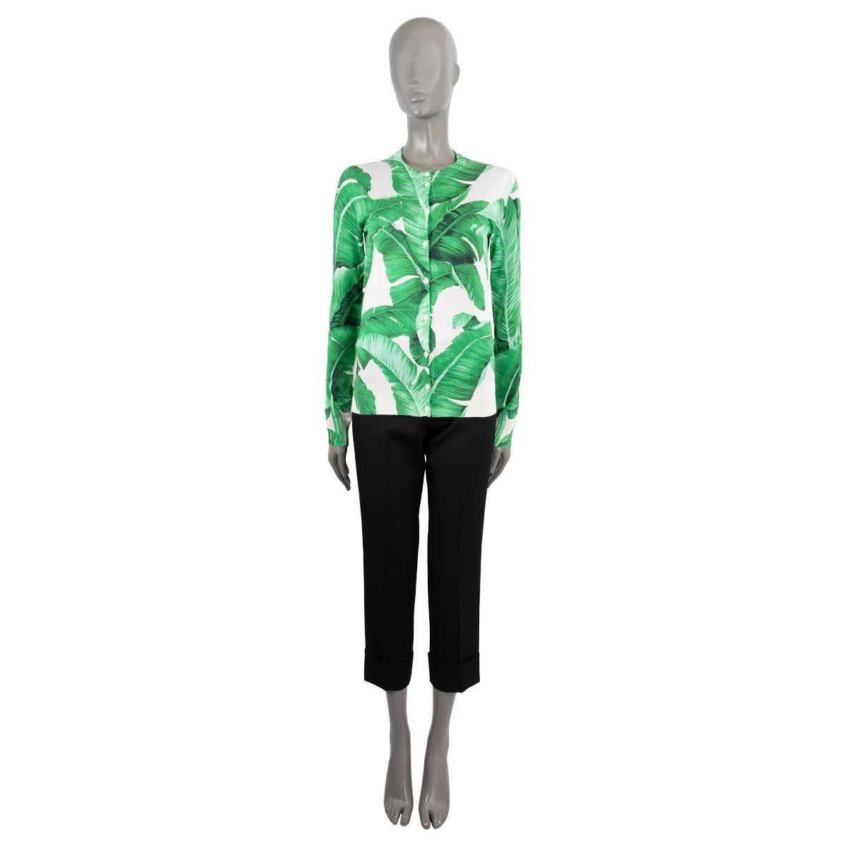 100% authentic Dolce & Gabbana banana leaf print cardigan in green, black and off-white silk (100%). Closes with buttons in the front. Has been worn and is in excellent condition.

2016 Fall/Winter Botanical Garden Collection

Measurements
Tag