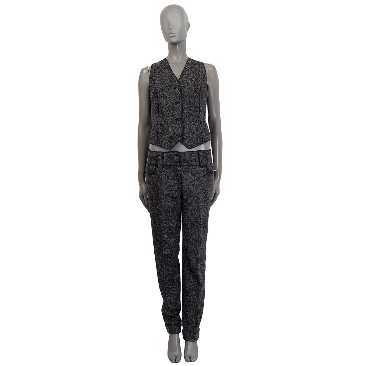 100% authentic Dolce & Gabbana buttoned vest in grey and black nylon (10%) (silk 30%) alpaca (60%) with a V-neckline, two slit pockets in the front, a felted fabric in the front and the back in silk. Lined in black silk (100%). Has been worn and is