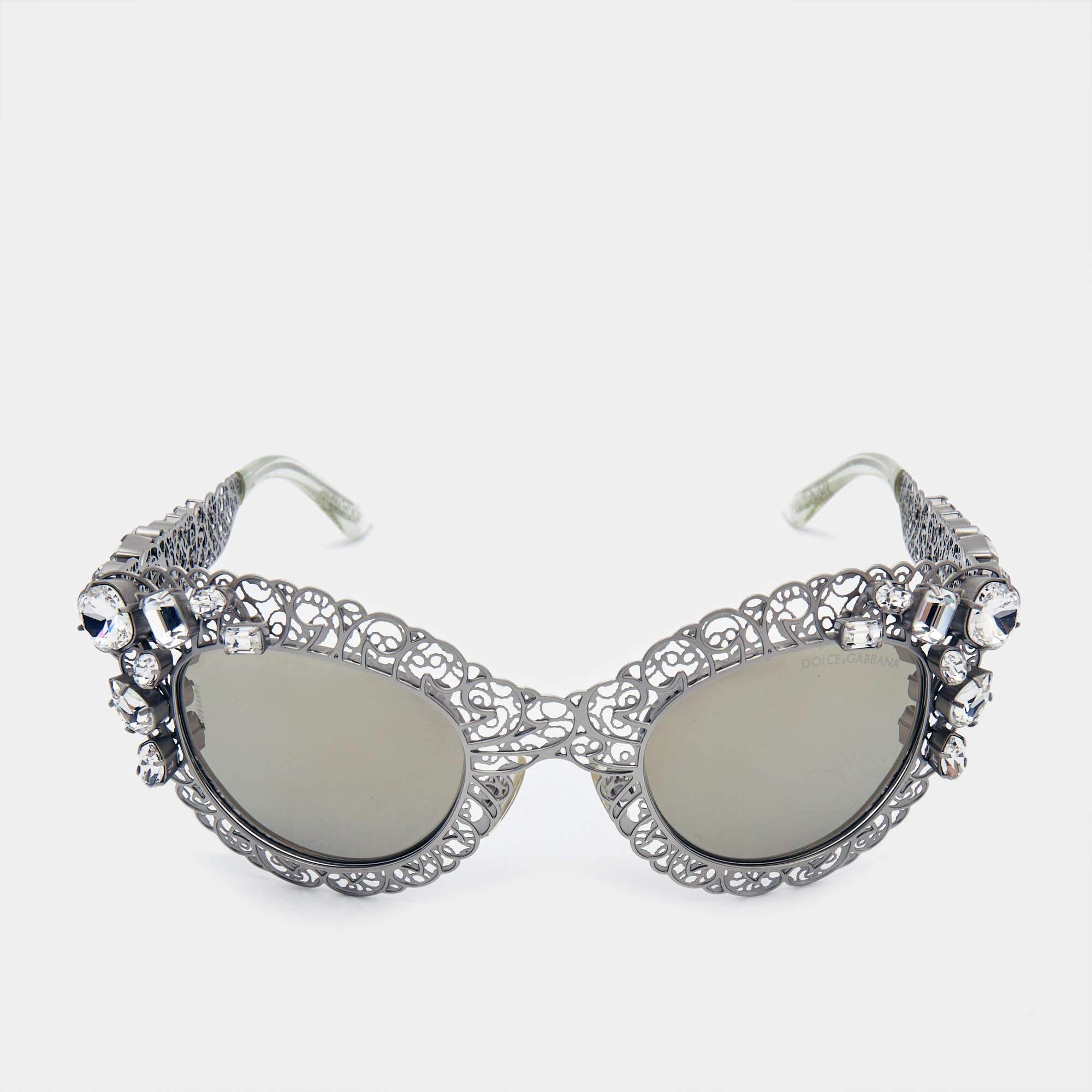 This pair of feminine cat eye sunglasses from Dolce & Gabbana has been crafted from acetate. It features an intricate filigree detailing and decorated with striking embellishments for an elevated look.

Includes
Original Case, Original Pouch, Brand