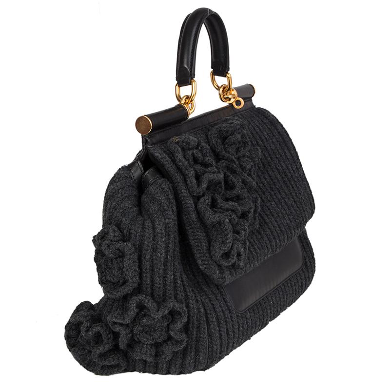 Dolce&Gabbana 'Knit Miss Sicily Medium' shoulder bag in antracite wool with flower appliquees and details in black leather. Removable and adjustbale shoulder strap. Closes with two magentic-snaps under the flap. Outside zipper pocket and D-ring on