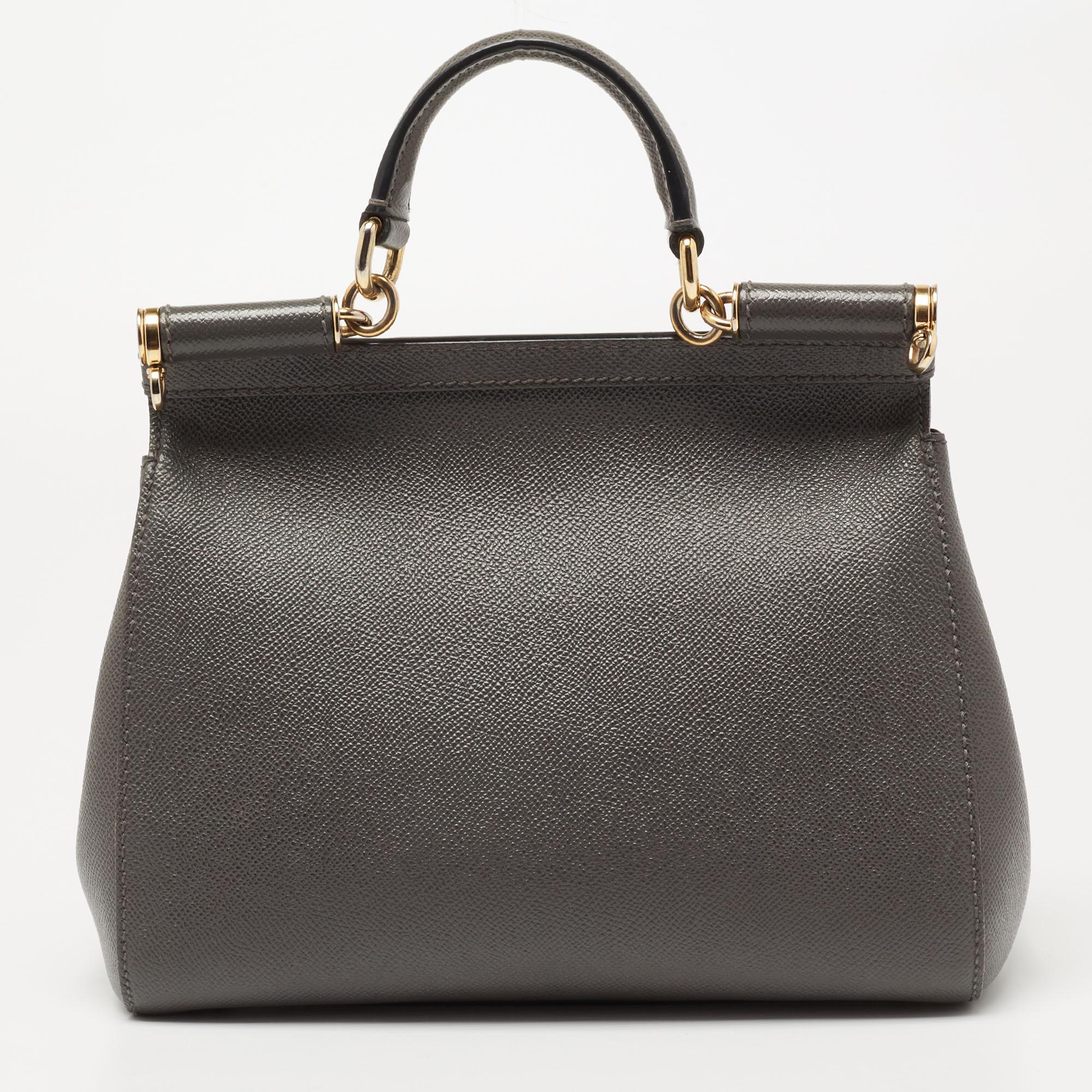 Presented for the 2009 Fall/Winter collection, Miss Sicily from Dolce & Gabbana represents the brand's regard for Italian essence and feminine style. This grey creation comes made from leather and can be carried conveniently by dual carrying