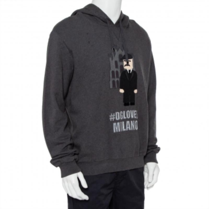 Effortlessly stylish and very trendy, this hooded sweatshirt from Dolce & Gabbana is a must-have in your sporty wardrobe! The grey creation is made of 100% cotton and styled with quirky patchwork details on the front. Pair it with distressed jeans