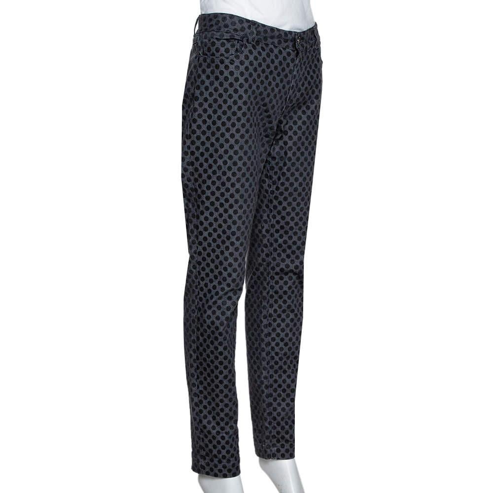Made from cotton these jeans from Dolce and Gabbana will be a perfect addition to your jeans collection. They carry a slim fit silhouette with button fastening on the front pockets and a fun polka dot design all over. This creation is a buy you wont