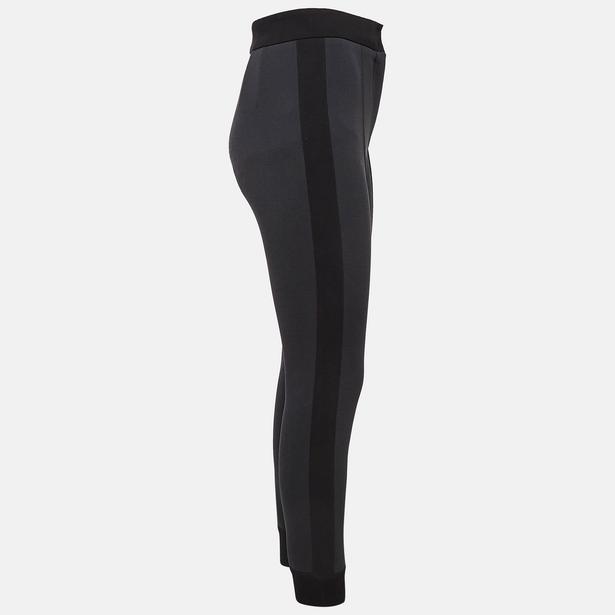 Embrace all day comfort with this pair of grey joggers designed by Dolce and Gabbana. The design is tailored well for the right fit and lasting wear.