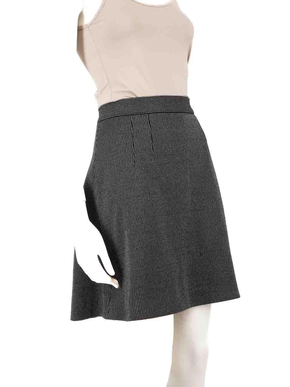 CONDITION is Very good. Minimal wear to skirt is evident. Minimal wear to the front with abrasion which has exposed the seam underneath on this used Dolce & Gabbana designer resale item.
 
 
 
 Details
 
 
 Grey
 
 Wool
 
 Skirt
 
 Striped pattern
