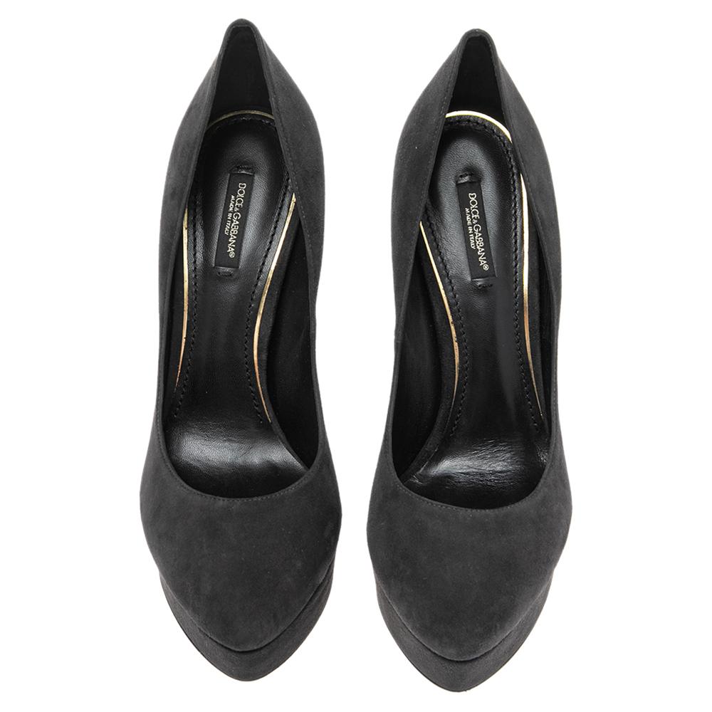 Add a luxe finish to your outfit with these Dolce & Gabbana platform pumps. They are crafted from grey suede and designed with covered toes, platforms, and 14.5 cm heels.

Includes: Original Box, Price Tag