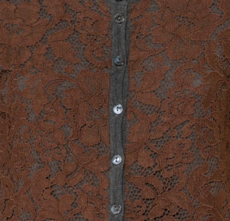 From Dolce & Gabbana comes this prize of a piece that is made from quality materials and designed as a chic cardigan. The creation has front buttons and long sleeves. It is further adorned with lace panels at the front. It is perfect for a host of