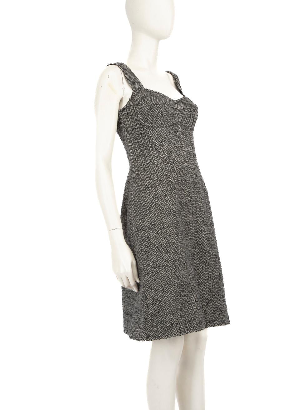 CONDITION is Never worn, with tags. No visible wear to the dress is evident on this new Dolce & Gabbana designer resale item.
  
  Details
  
  
  Grey 
  
  Wool 
  
  Dress
  
  Knee length 
  
  Sleeveless 
  
  Figure hugging
  
  Tweed 
  
 