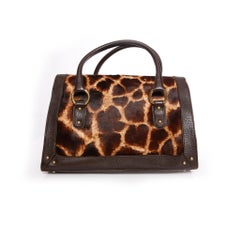 Dolce & Gabbana, Handbag with brown leather and giraffe print in calf hair.