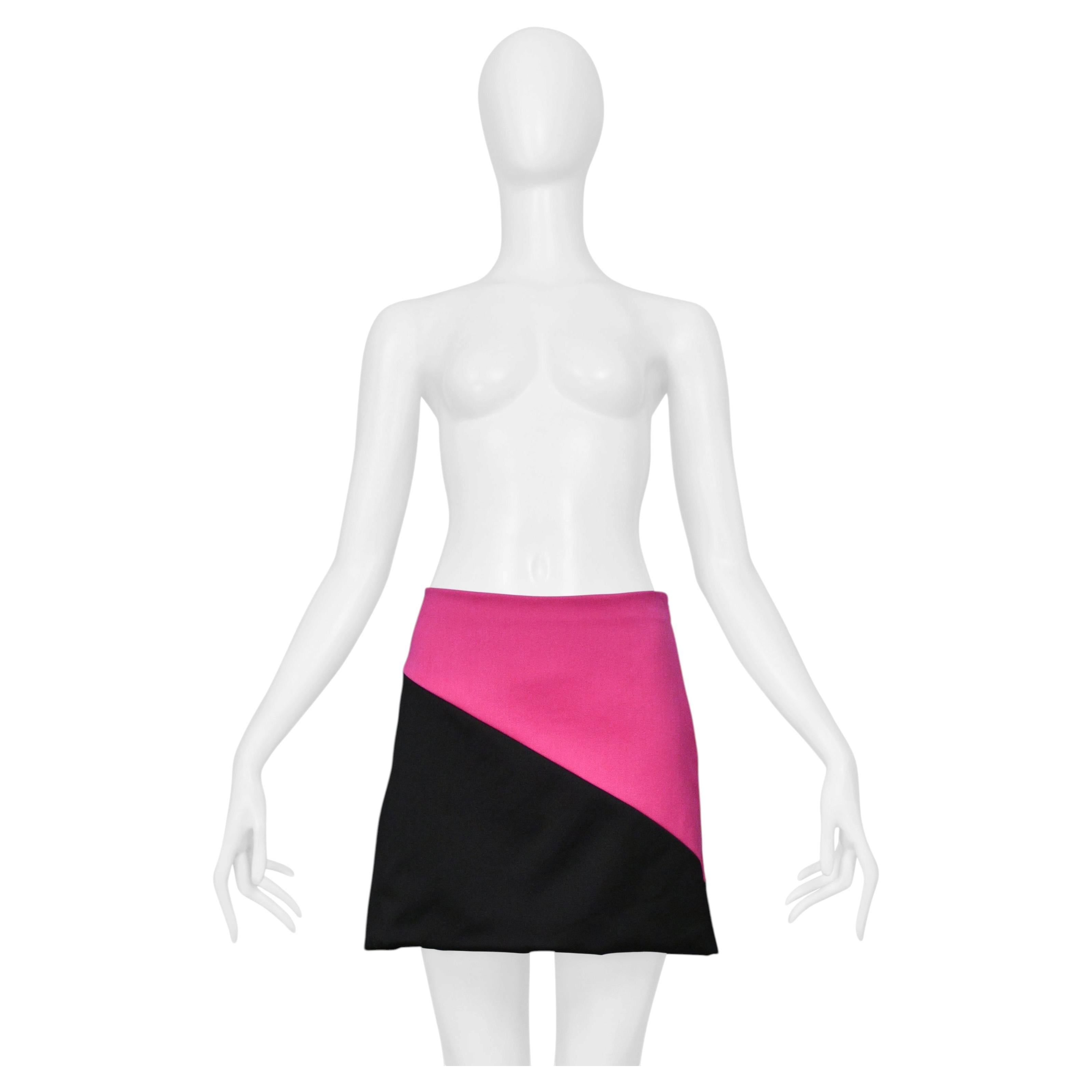 Minifalda de lana y cachemira rosa intenso y negro de Dolce & Gabbana en venta